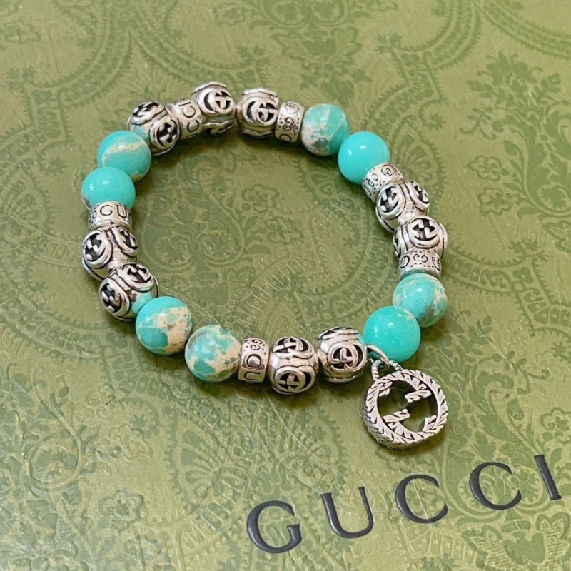 G*u*i bracelets